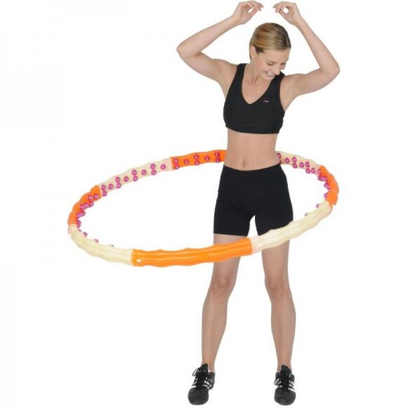 The girl shakes the hoop